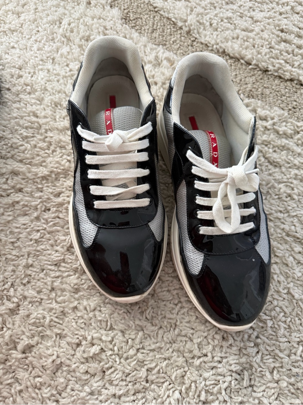 Prada Black and White Low-Top Patent Leather Sneakers